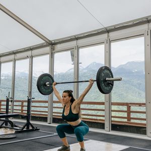 Athletes hands holding a barbell during workout session