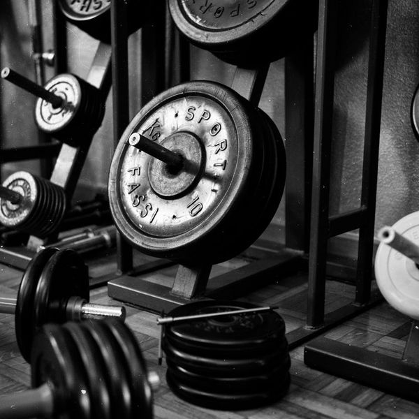 Professional gym interior with heavy weights and equipment